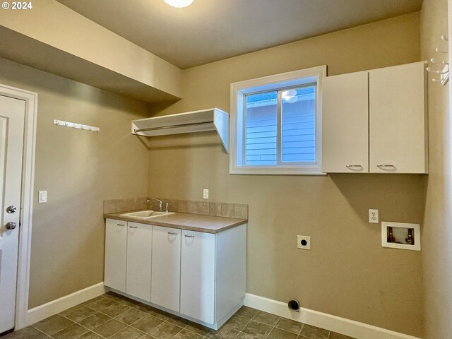 spare room featuring light colored carpet and plenty of natural light