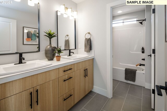 3603 N 12th Cir, Ridgefield, WA 98642 - full bath featuring tile patterned floors, double vanity, baseboards,  shower combination, and recessed lighting