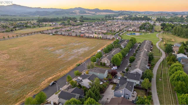 aerial view at dusk with a mountain view