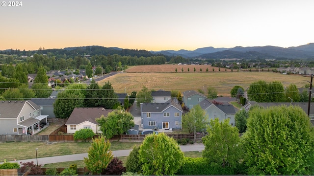 aerial view at dusk with a mountain view