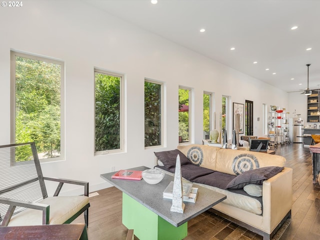 living room featuring recessed lighting, a ceiling fan, and hardwood / wood-style flooring