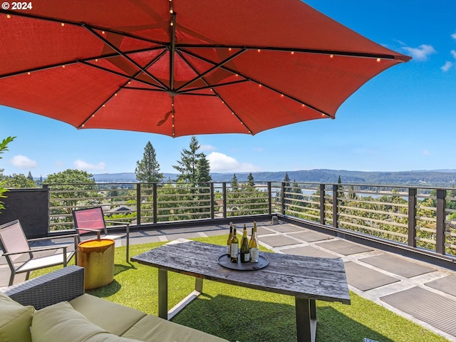 view of patio / terrace with a mountain view