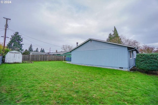 exterior space with a storage shed