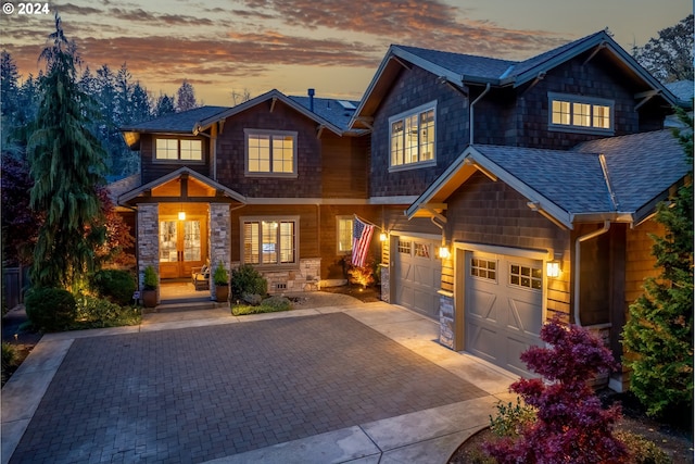 craftsman-style house featuring a garage