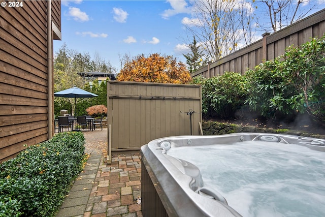 view of patio with a hot tub