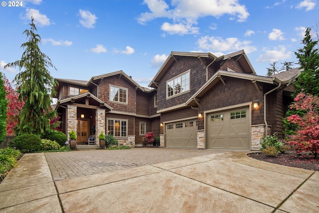 craftsman-style home featuring a garage