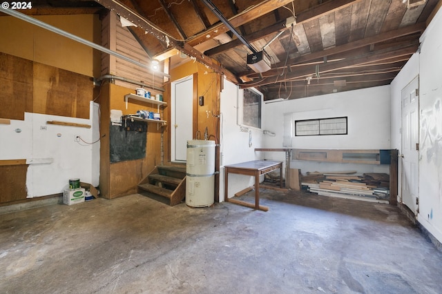 interior space featuring a garage door opener and water heater