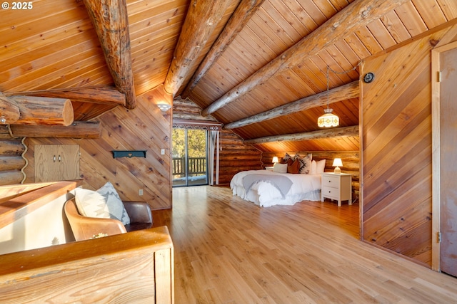 96 Mount Adams Rd, Trout Lake, WA 98650 - bedroom with access to outside, rustic walls, wooden ceiling, and hardwood / wood-style floors