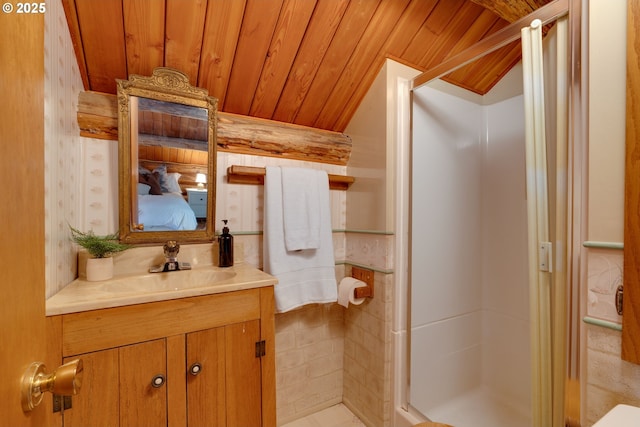 bathroom with lofted ceiling, vanity, walk in shower, and wooden ceiling