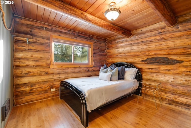96 Mount Adams Rd, Trout Lake, WA 98650 - bedroom featuring hardwood / wood-style flooring, a wooden ceiling with exposed beams, and rustic walls