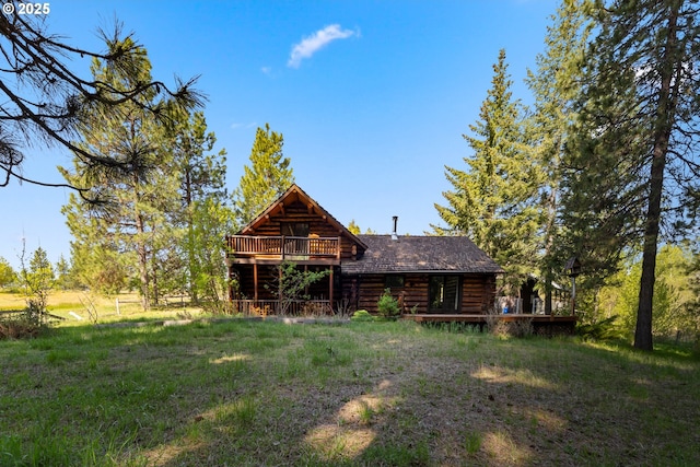 96 Mount Adams Rd, Trout Lake, WA 98650 - rear view of house with log exterior and a wooden deck