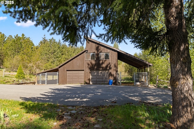 96 Mount Adams Rd, Trout Lake, WA 98650 - view of side of property featuring driveway and an outbuilding