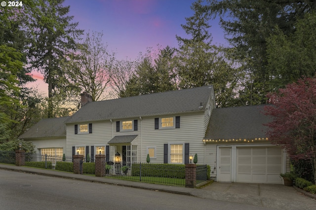 view of front of property featuring a garage