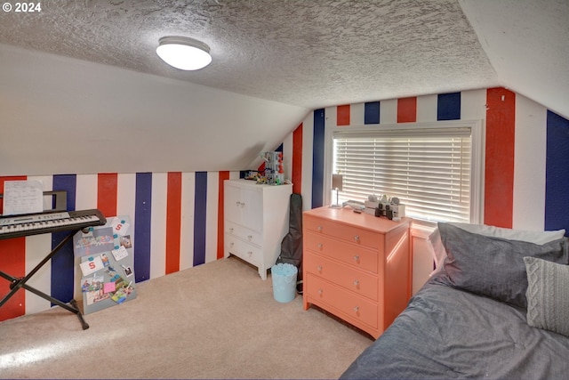 bedroom featuring wallpapered walls, lofted ceiling, light colored carpet, and a textured ceiling