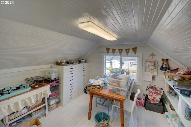 home office featuring light wood-type flooring, wooden ceiling, and vaulted ceiling
