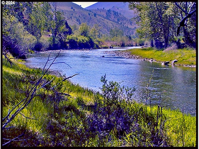 50889 Hwy 26, Mount Vernon, OR 97865 - water view with a mountainous background