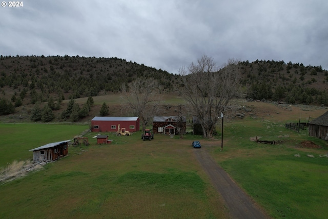 aerial view featuring a mountain view and a rural view