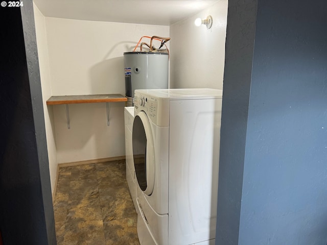 washroom featuring separate washer and dryer and electric water heater