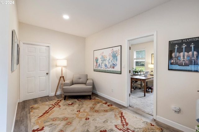 sitting room featuring hardwood / wood-style flooring