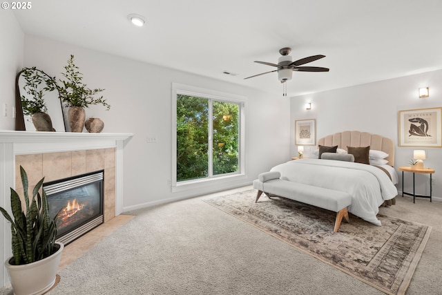 2834 SE Franklin St, Portland, OR 97202 - bedroom with carpet, a tile fireplace, and ceiling fan