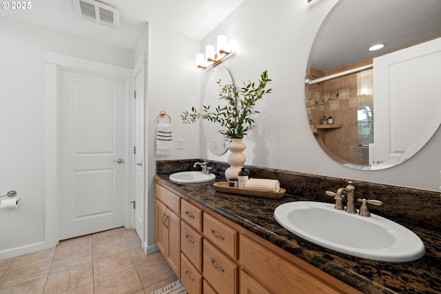 2834 SE Franklin St, Portland, OR 97202 - bathroom featuring double vanity, tiled shower, and tile patterned floors