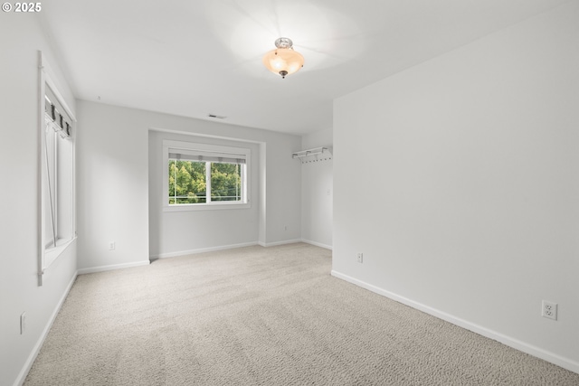 2834 SE Franklin St, Portland, OR 97202 - carpeted spare room featuring baseboards