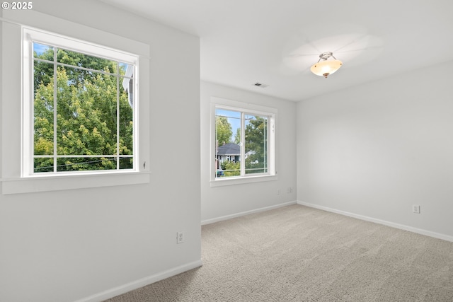 2834 SE Franklin St, Portland, OR 97202 - spare room featuring baseboards and carpet floors