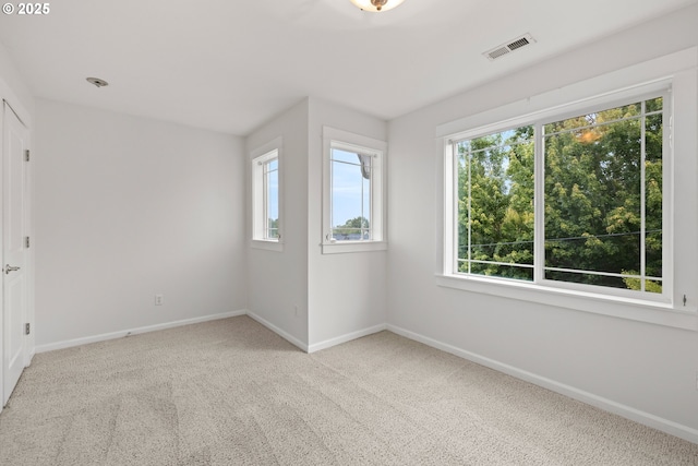 2834 SE Franklin St, Portland, OR 97202 - carpeted empty room featuring baseboards