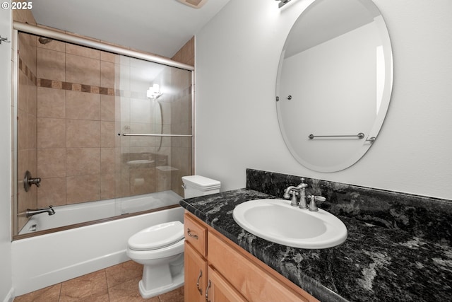 2834 SE Franklin St, Portland, OR 97202 - full bathroom with vanity, bath / shower combo with glass door, and tile patterned flooring