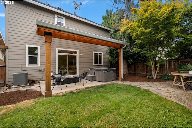 2834 SE Franklin St, Portland, OR 97202 - back of property featuring a hot tub and a patio