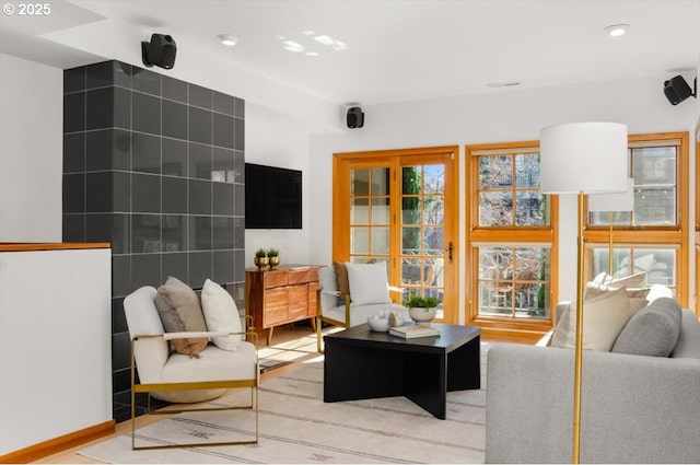 living room with light hardwood / wood-style flooring