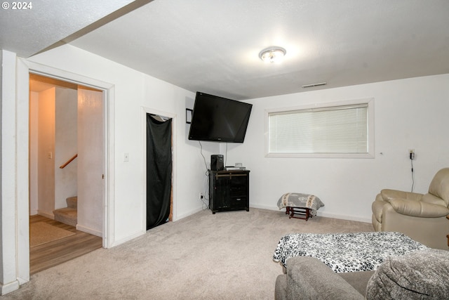 living room featuring carpet