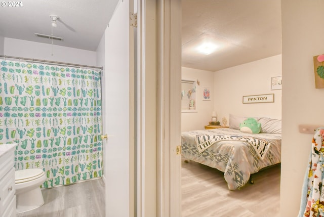 bedroom with light wood-type flooring