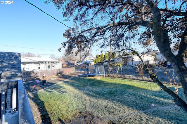 view of yard with a trampoline