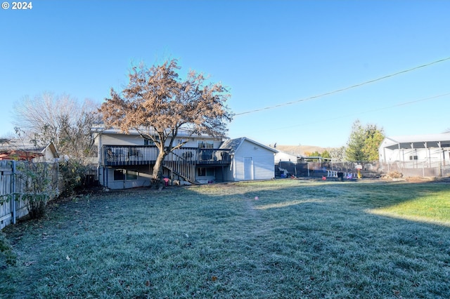 view of yard featuring a deck