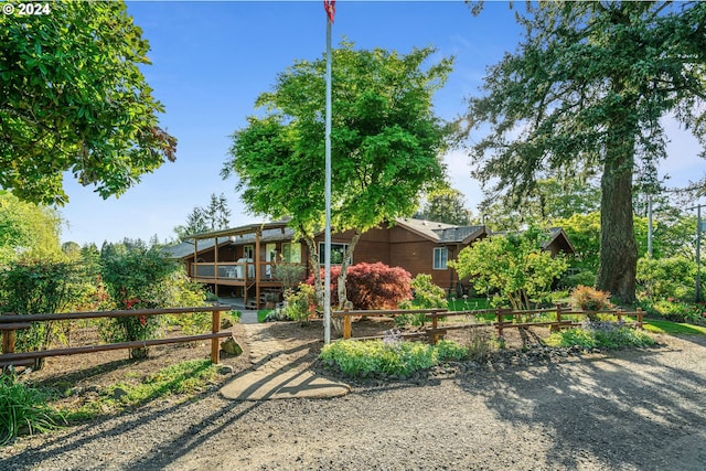 view of front of house featuring a deck