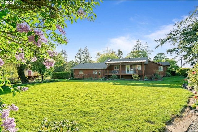 exterior space with a front lawn