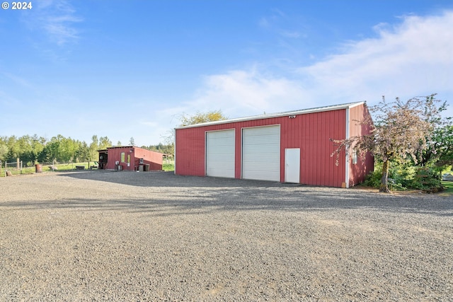 view of outdoor structure with a garage