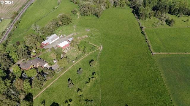 birds eye view of property featuring a rural view