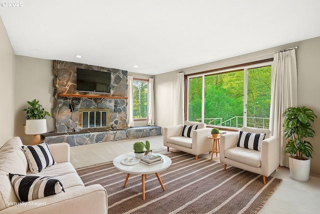 living room featuring a fireplace