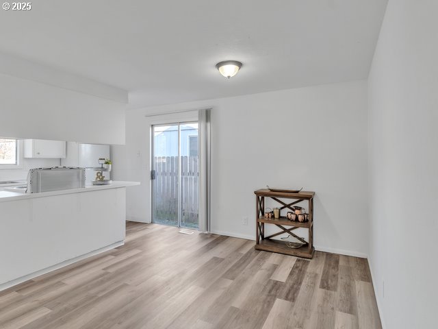 interior space with light hardwood / wood-style flooring