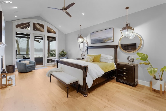 bedroom featuring vaulted ceiling, light hardwood / wood-style floors, access to exterior, and ceiling fan