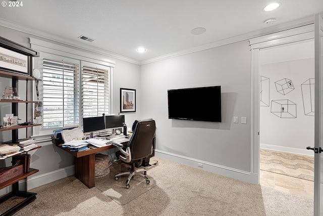 carpeted home office with crown molding