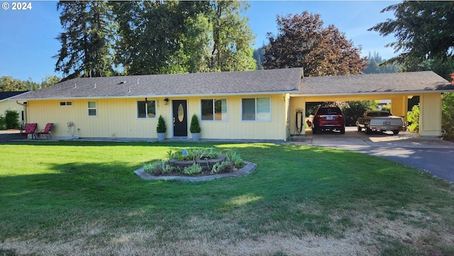 ranch-style house with a front lawn and a carport