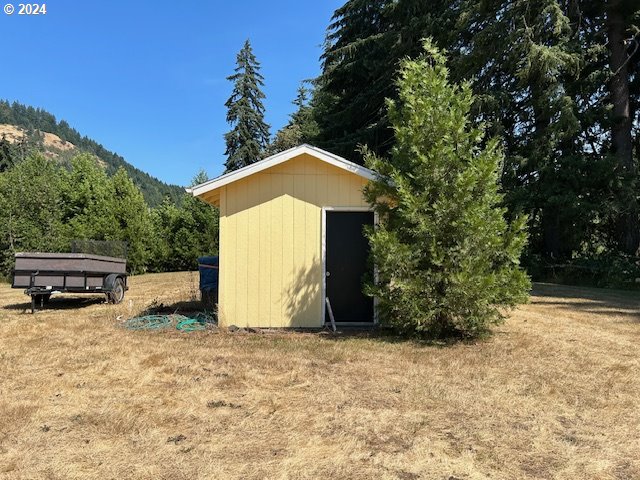 view of outdoor structure with a mountain view