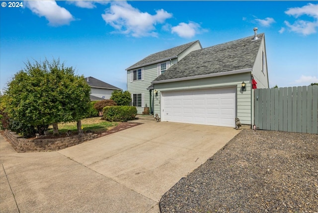 view of front of property featuring a garage