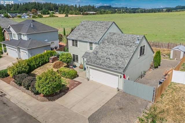 view of front of home with a rural view