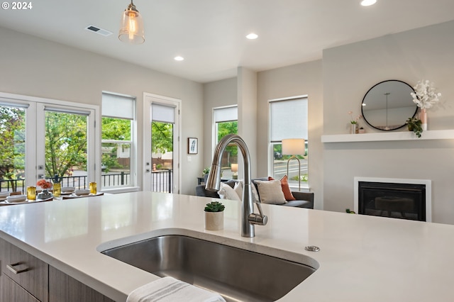 kitchen with sink and hanging light fixtures