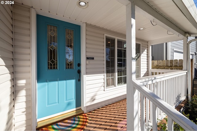 doorway to property with a porch