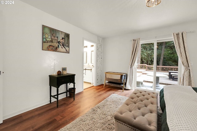 sitting room with hardwood / wood-style floors